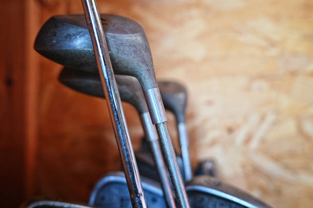 Old golf clubs in storage.